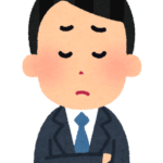 悩む人