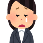 悩む人