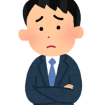 悩む人