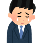 悩む人