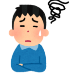 悩む人