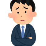 悩む人